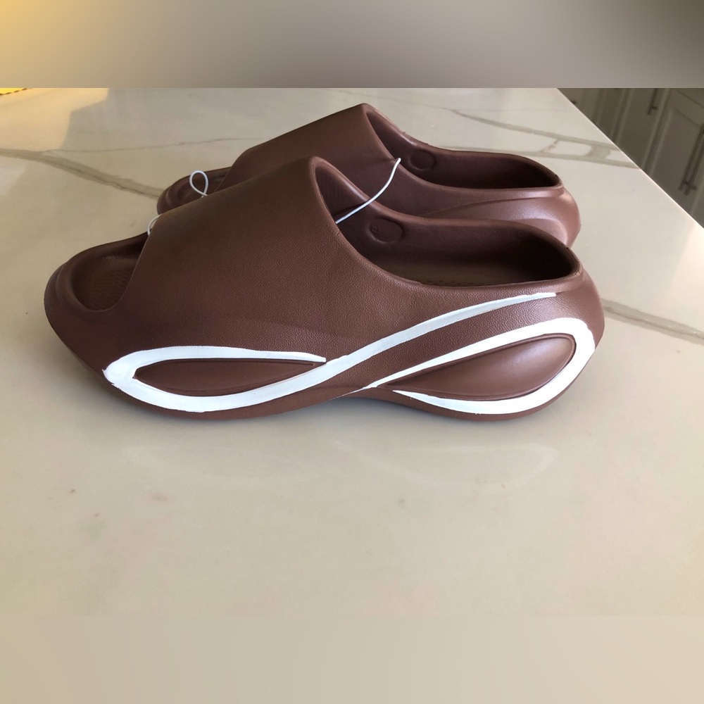 DIUS slides. Size 5.5-7 two pairs and third pair size 7.5-8